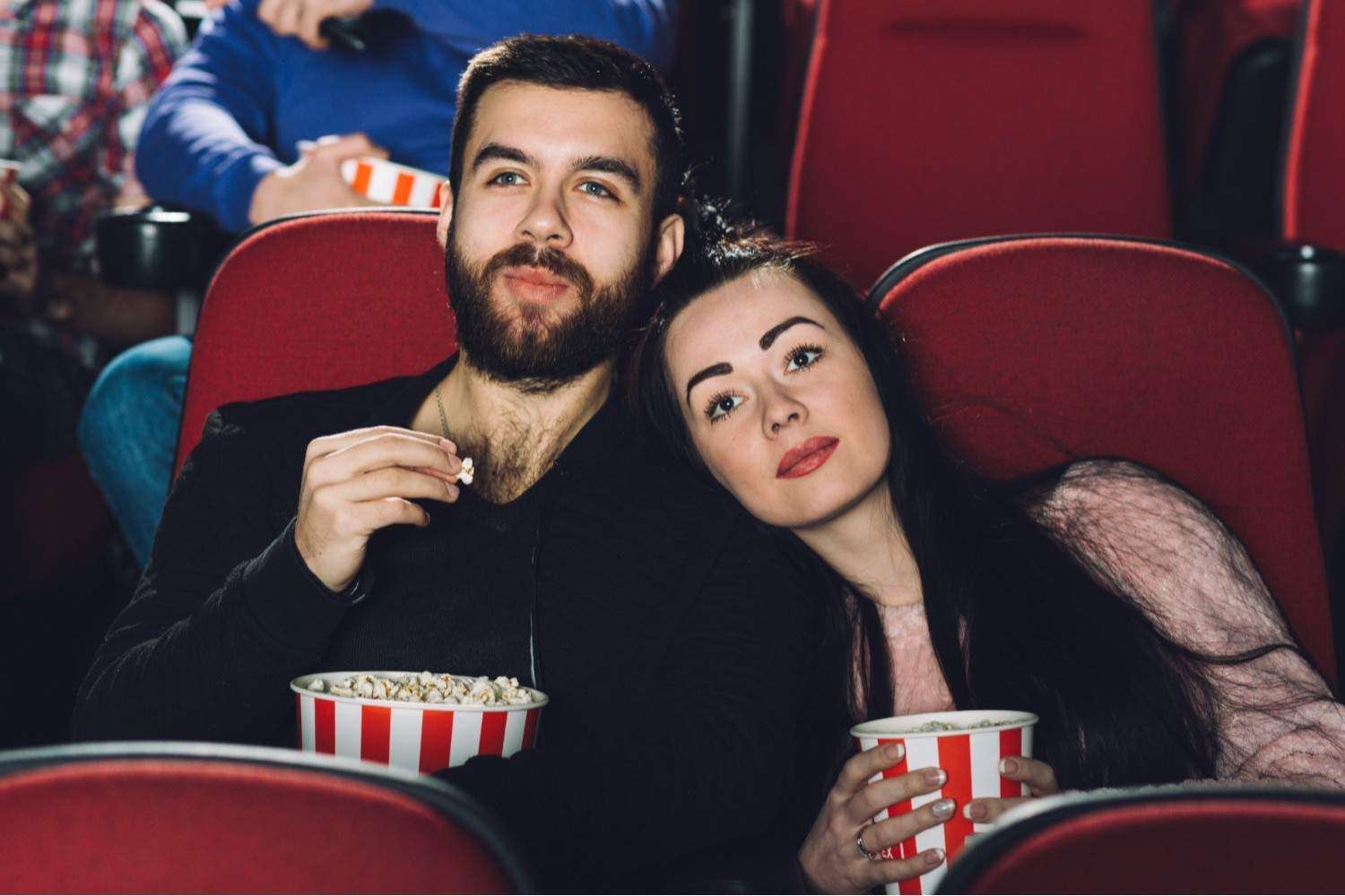 Couple at a date in movie theater