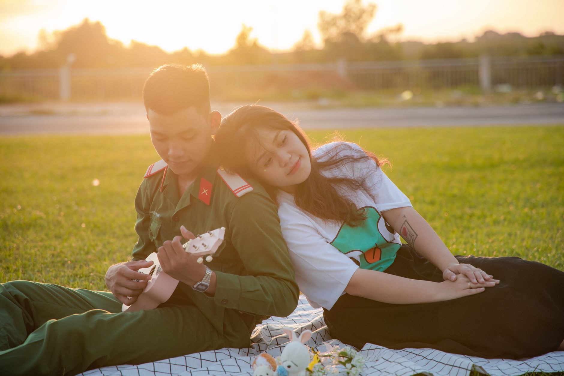 Couple enjoying a sunset picnic outdoors