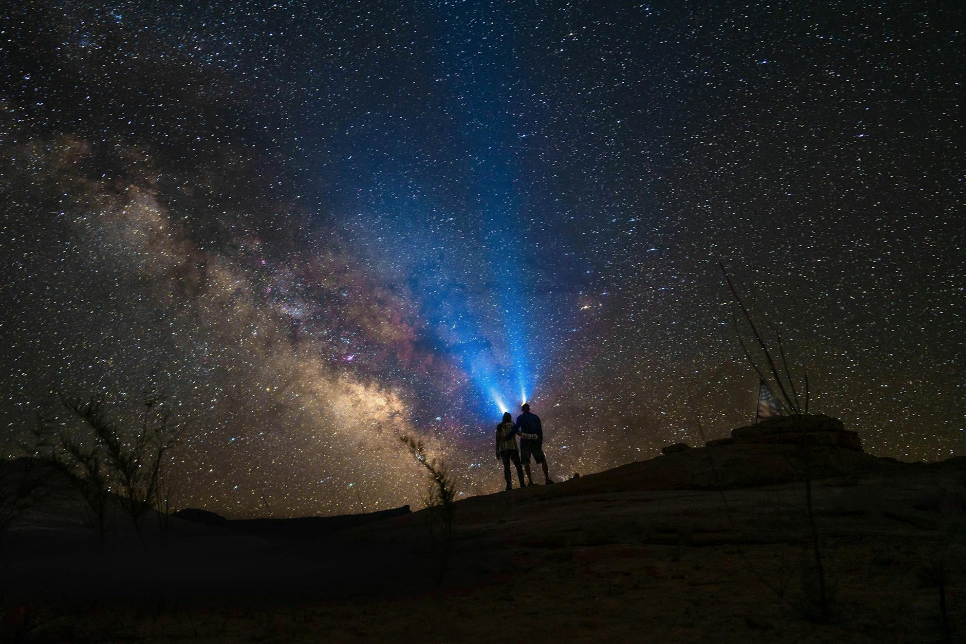 Stargazing together under the desert night sky
